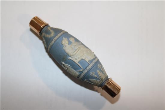 A gold mounted cut glass scent bottle, probably c.1850, 3 7/8in.